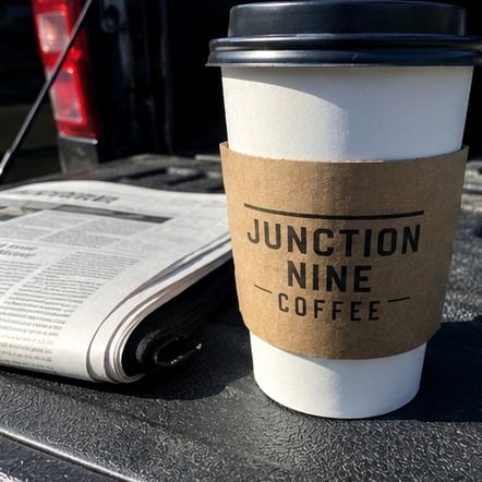Branded coffee sleeves with logo